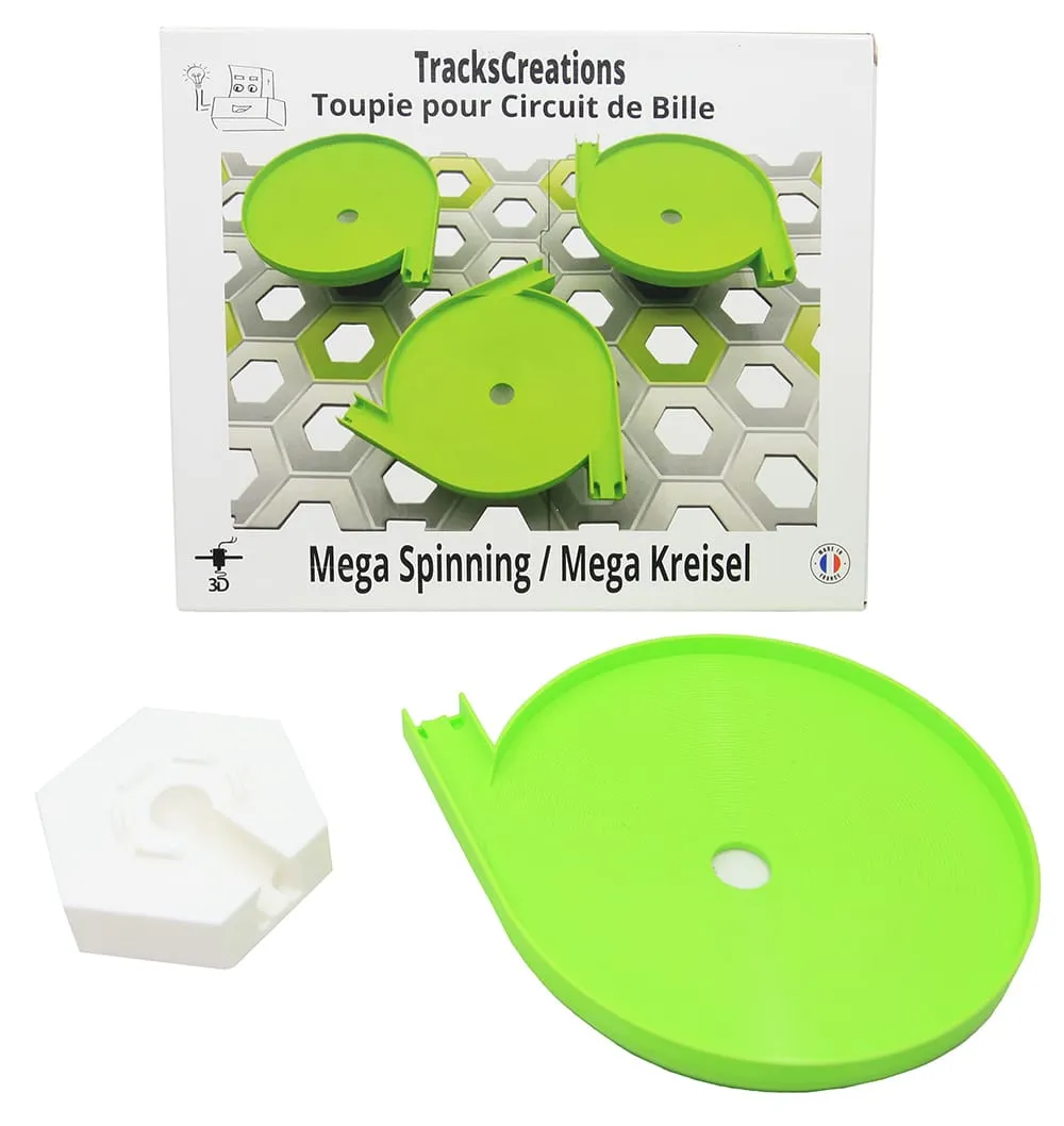 Méga toupie verte et son support blanc devant la boîte TracksCreations