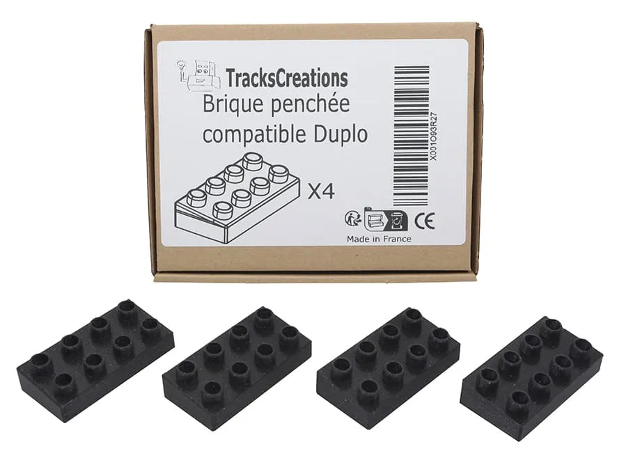 Lot de 4 briques penchées noires devant leur boîte TracksCreations